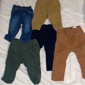 Set of little boy jeans. Colors green, mustard yellow, light brown, black, blue